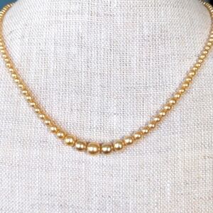 Vintage Japanese Akoya pearl necklace. Sterling .  Candlelight hue.  4-7mm.